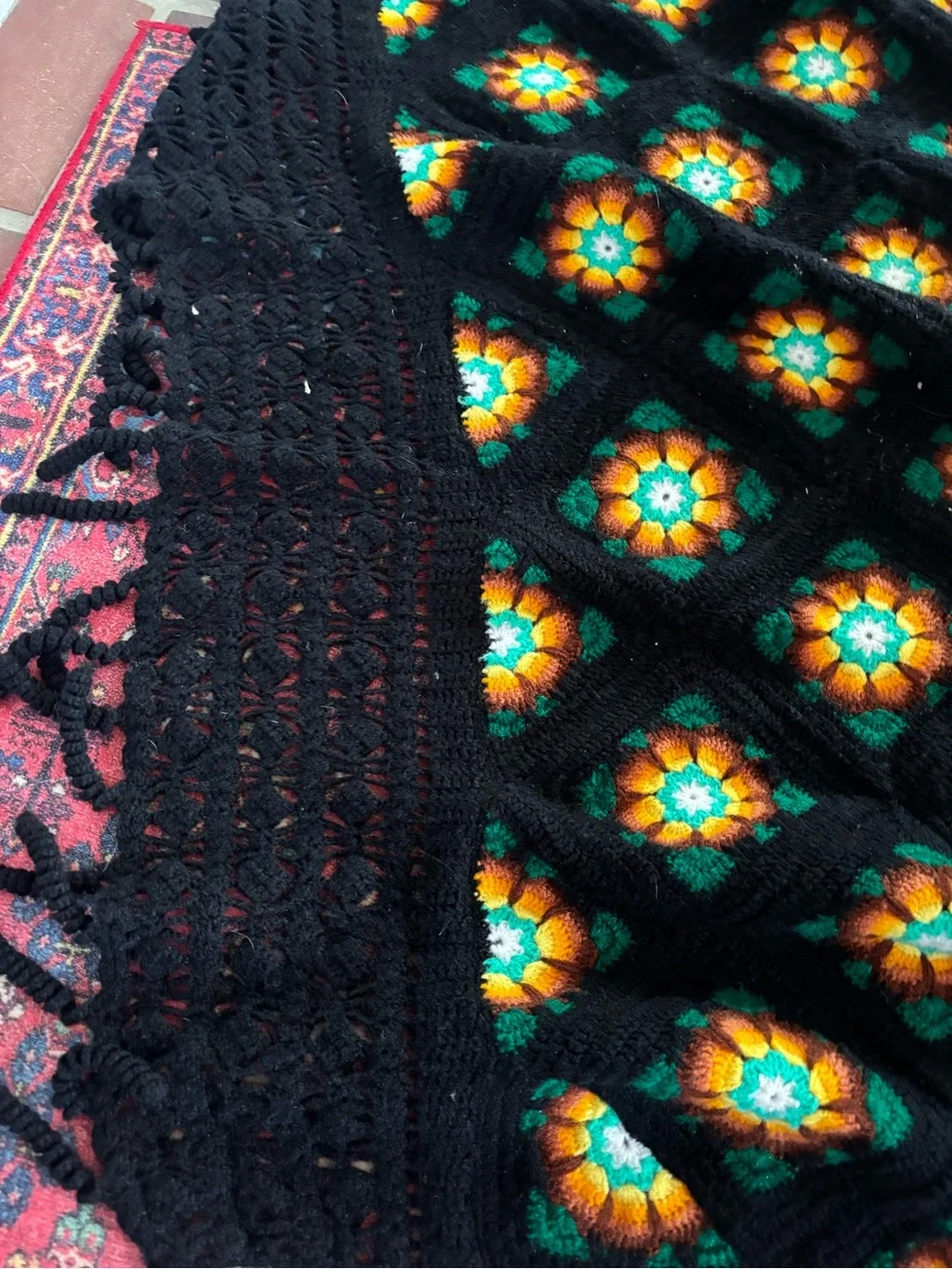 Handmade Black Crochet afghan with Green and Orange Floral Motif